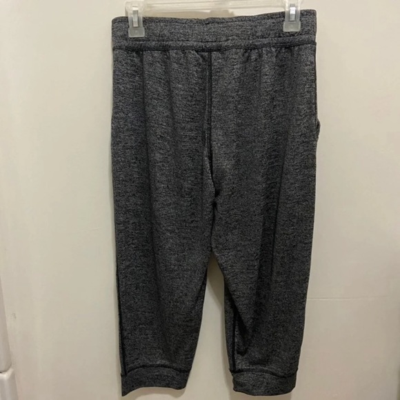 UNDER ARMOUR UA HEATGEAR® TECH TWIST JOGGER CAPRI - Picture 5 of 9